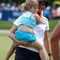 Karrie with her niece Olivia as she ran out onto the 18th Green after the final round.